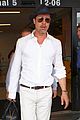 brad pitt wears all white for his lax arrival 10