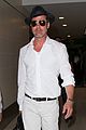brad pitt wears all white for his lax arrival 12