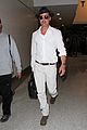 brad pitt wears all white for his lax arrival 13