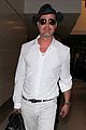 brad pitt wears all white for his lax arrival 14