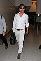 brad pitt wears all white for his lax arrival 15