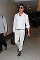 brad pitt wears all white for his lax arrival 18