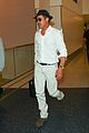 brad pitt wears all white for his lax arrival 20
