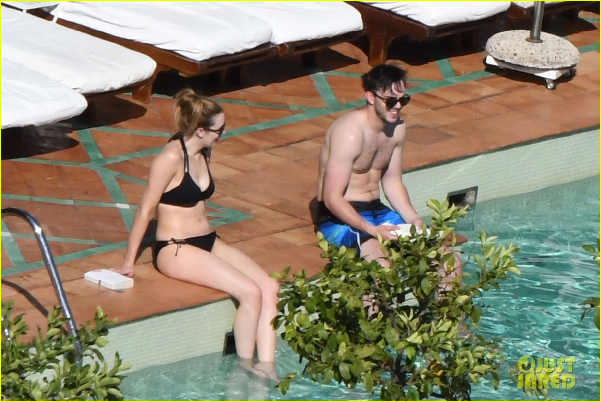 nicholas hoult shirtless by the pool 093716986