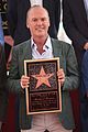 michael keaton gets honored by son sean douglas at hollywood walk of fame ceremony 06