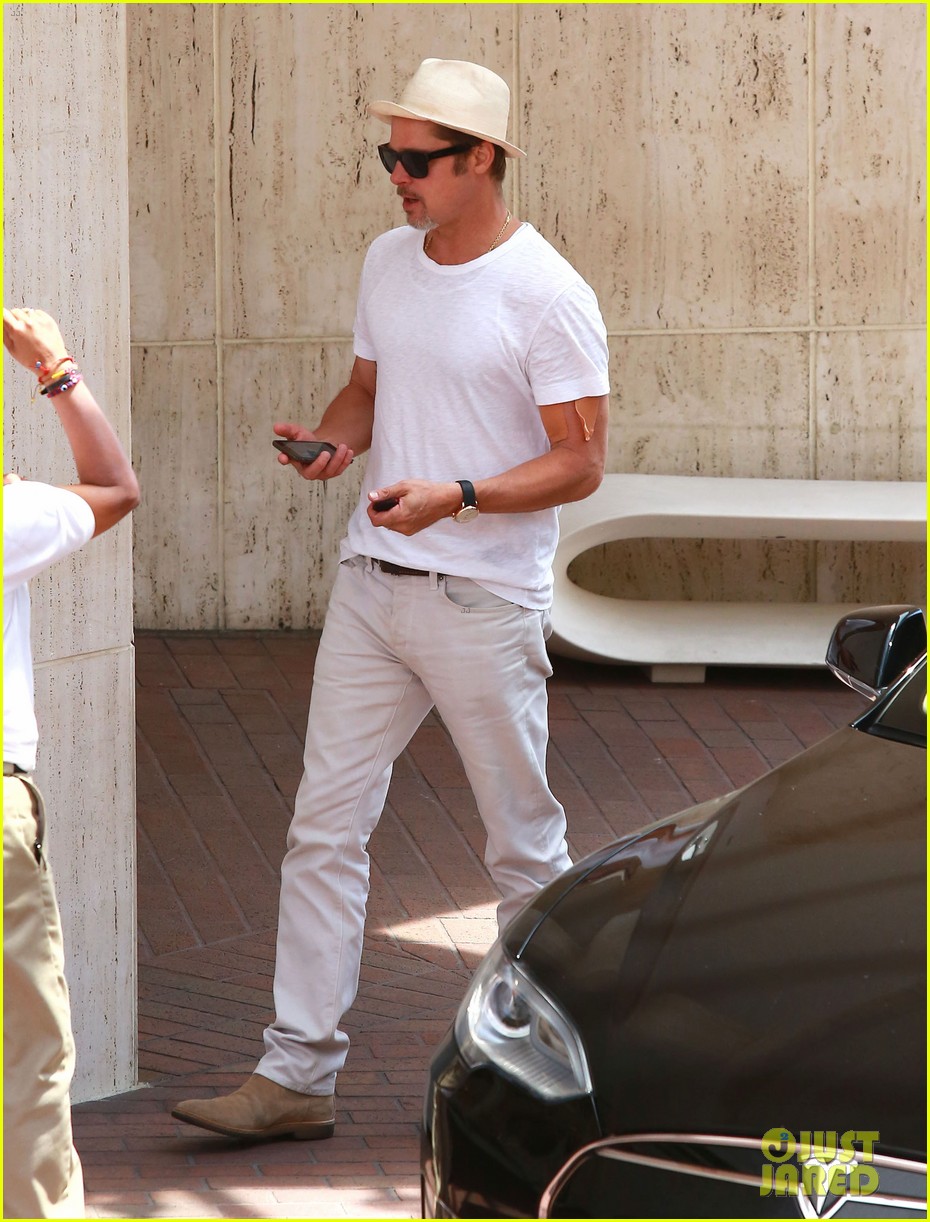 Brad Pitt Sports an Arm Bandage While Shopping with Maddox Photo