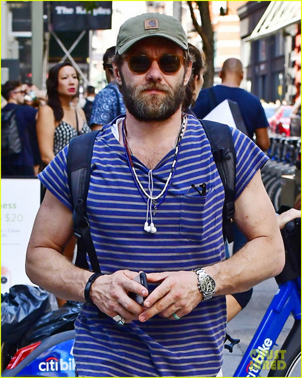 joel edgerton sports stripes while out and about in soho 04
