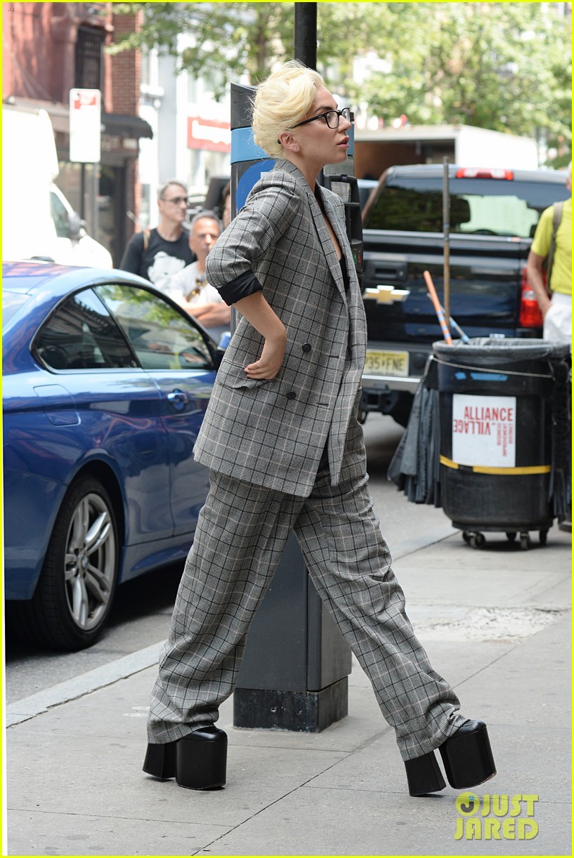 lady gaga wears an over sized suit with her sky high shoes 243726300