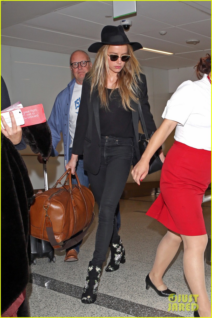 amber heard lands lax from london 02