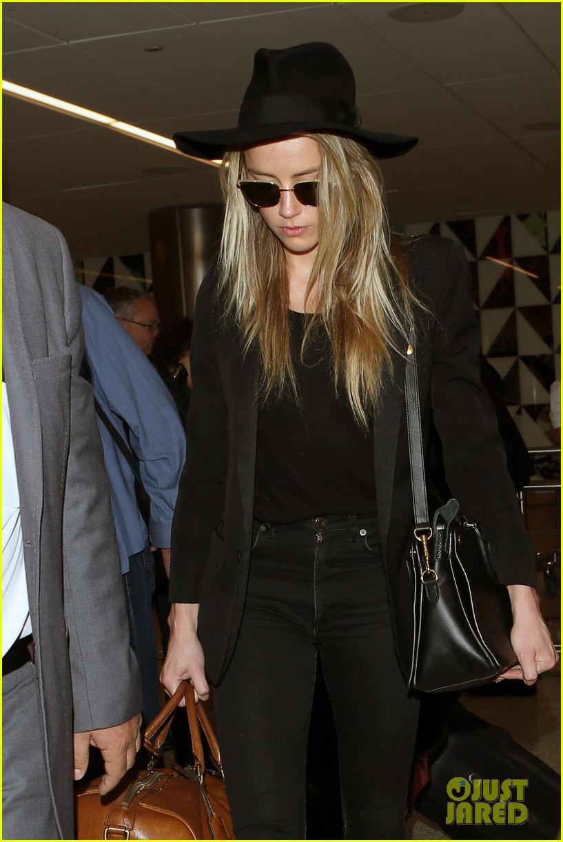 amber heard lands lax from london 10