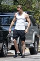 charlie hunnam bares his toned physique in a tank top 01