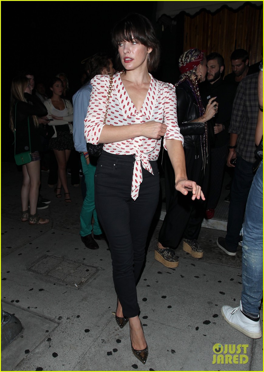 milla jovovich kris jenner and brooklyn beckham party at the nice guy 07