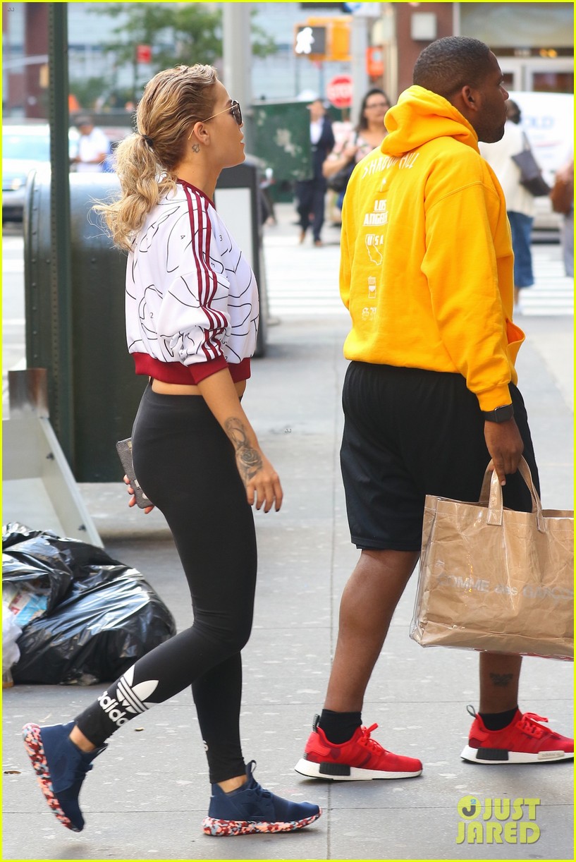 rita ora gets distracted by an adorable pup on her way to work 023737835