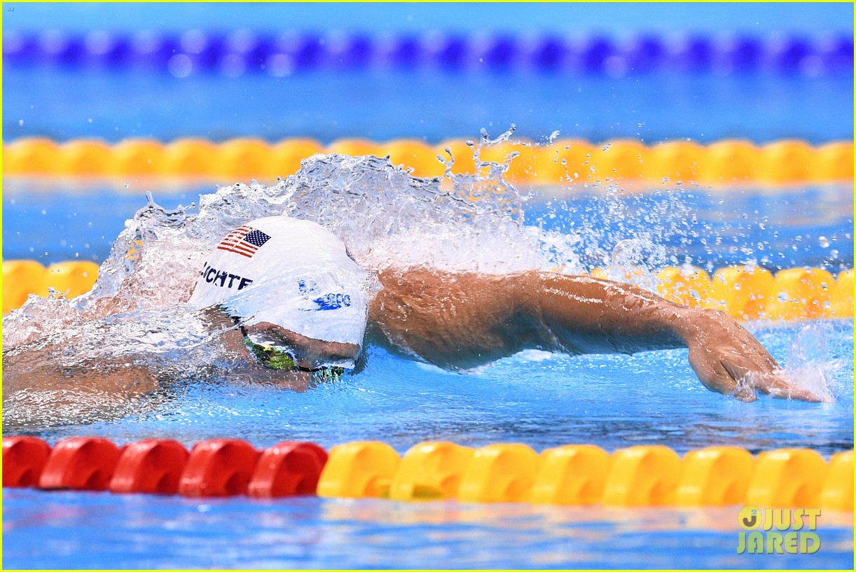 michael phelps picks up 21st gold medal after ripping his cap 063730133