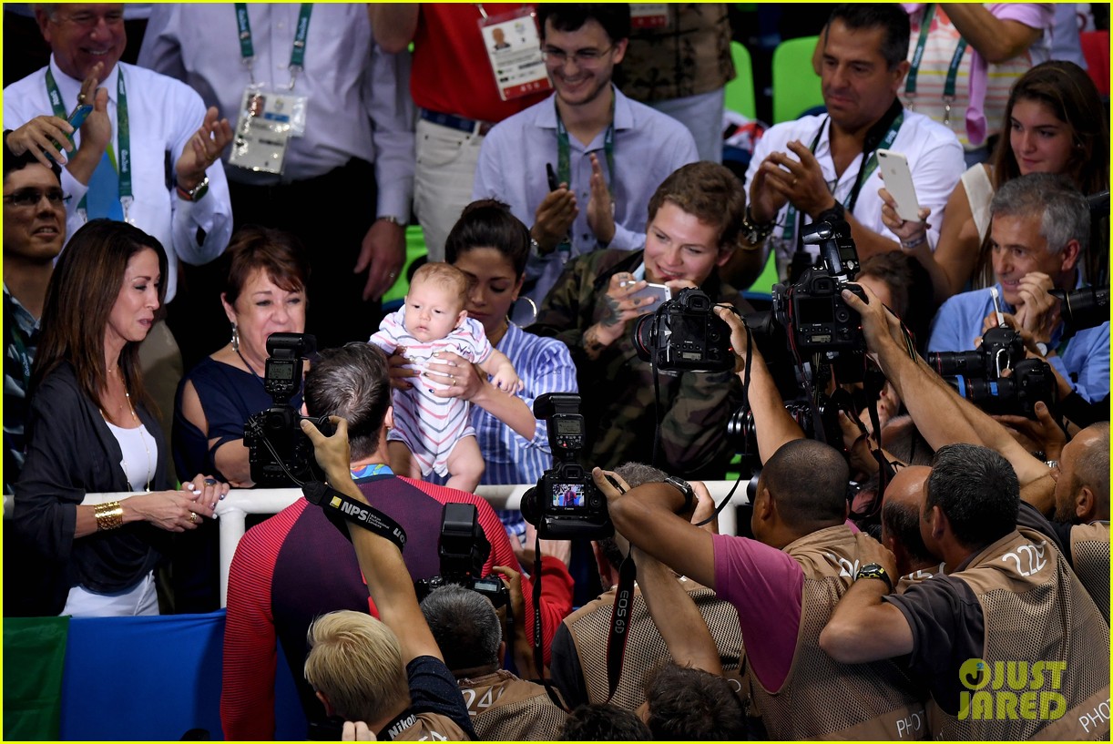 michael phelps kisses baby boomer after big olympics wins 053730148