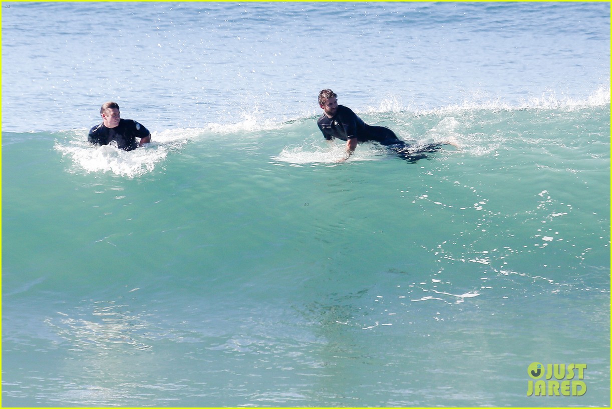 liam hemsworth goes for monday morning surf session with brother luke 043770454