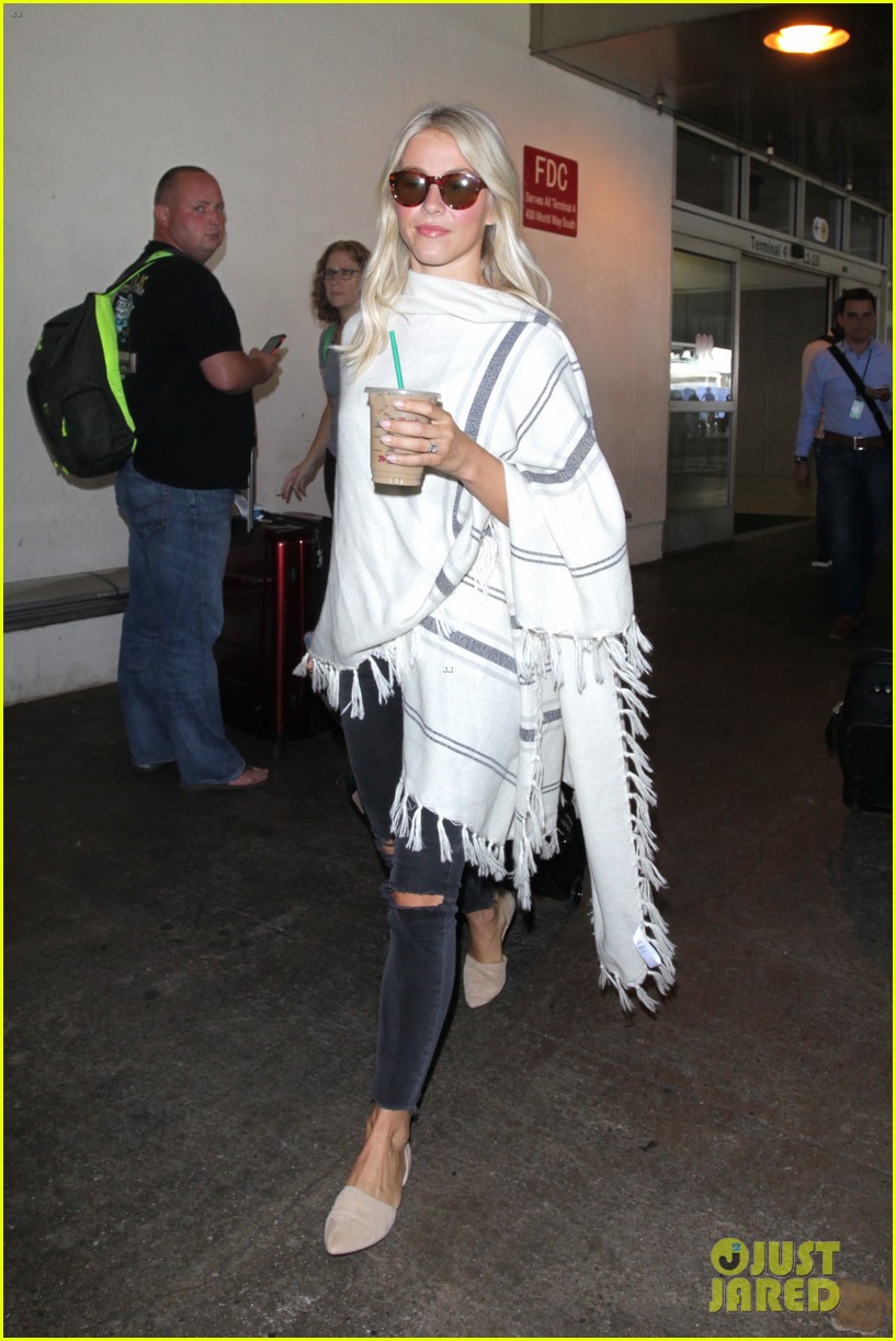 julianne hough grabs an iced coffee after arriving at lax airport 013753202