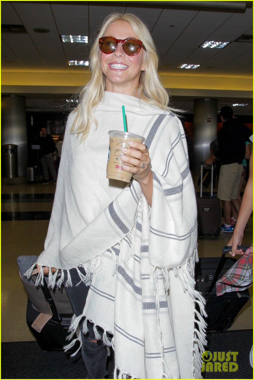 julianne hough grabs an iced coffee after arriving at lax airport 053753206