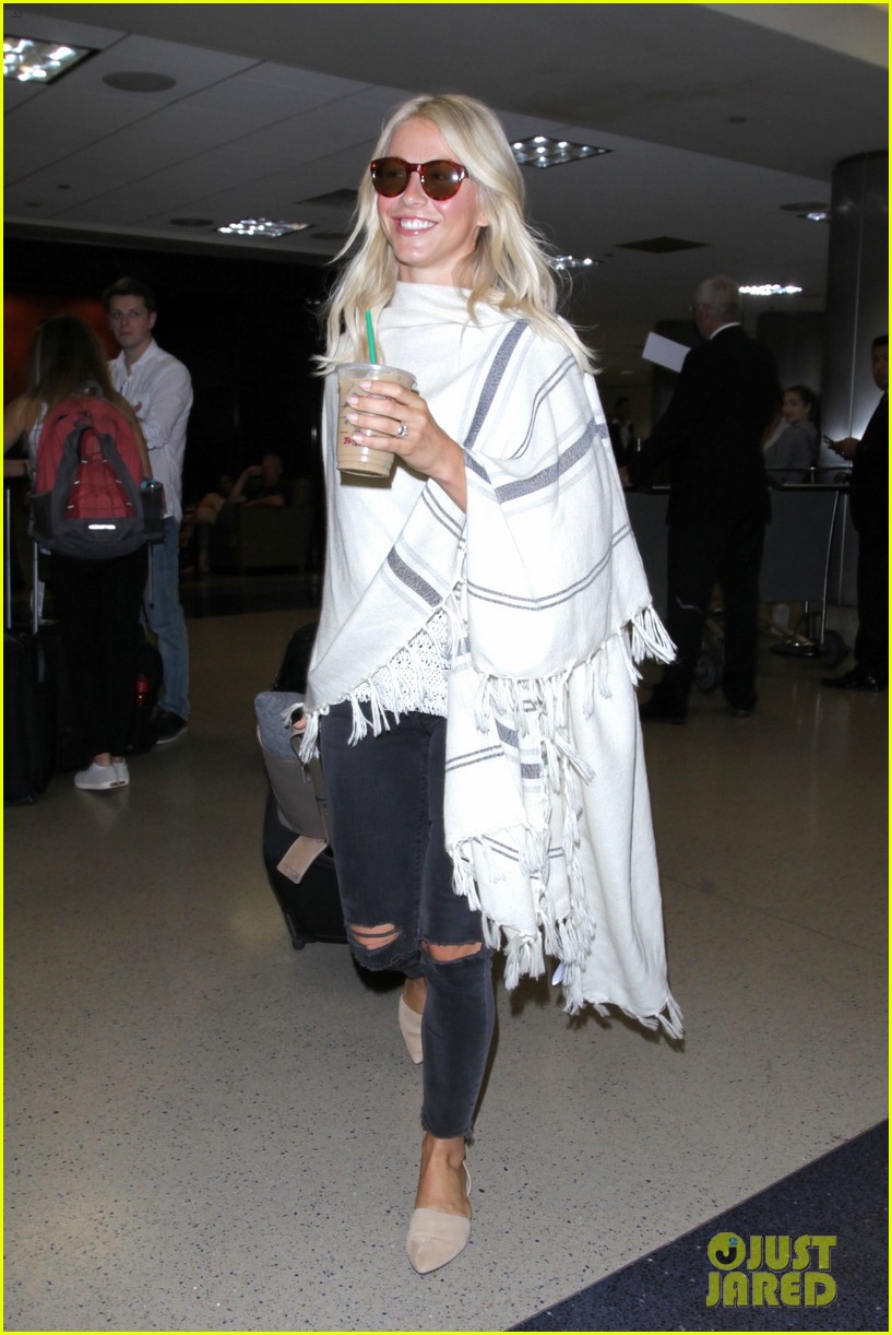 julianne hough grabs an iced coffee after arriving at lax airport 103753211