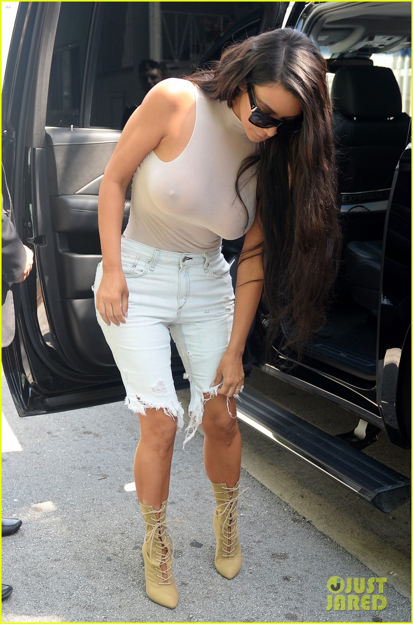 kim kardashian goes braless while wearing see through top 01