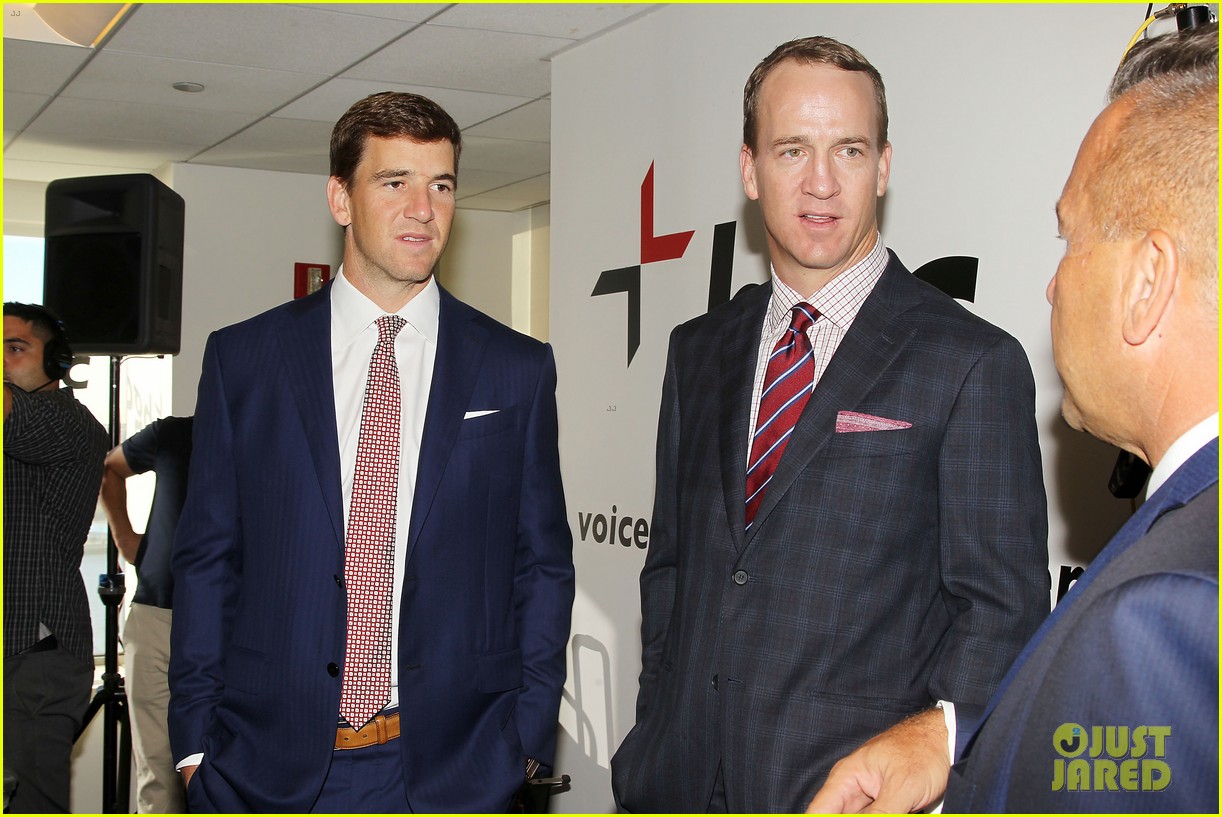 eli peyton manning join other celebs at 911 charity day 04