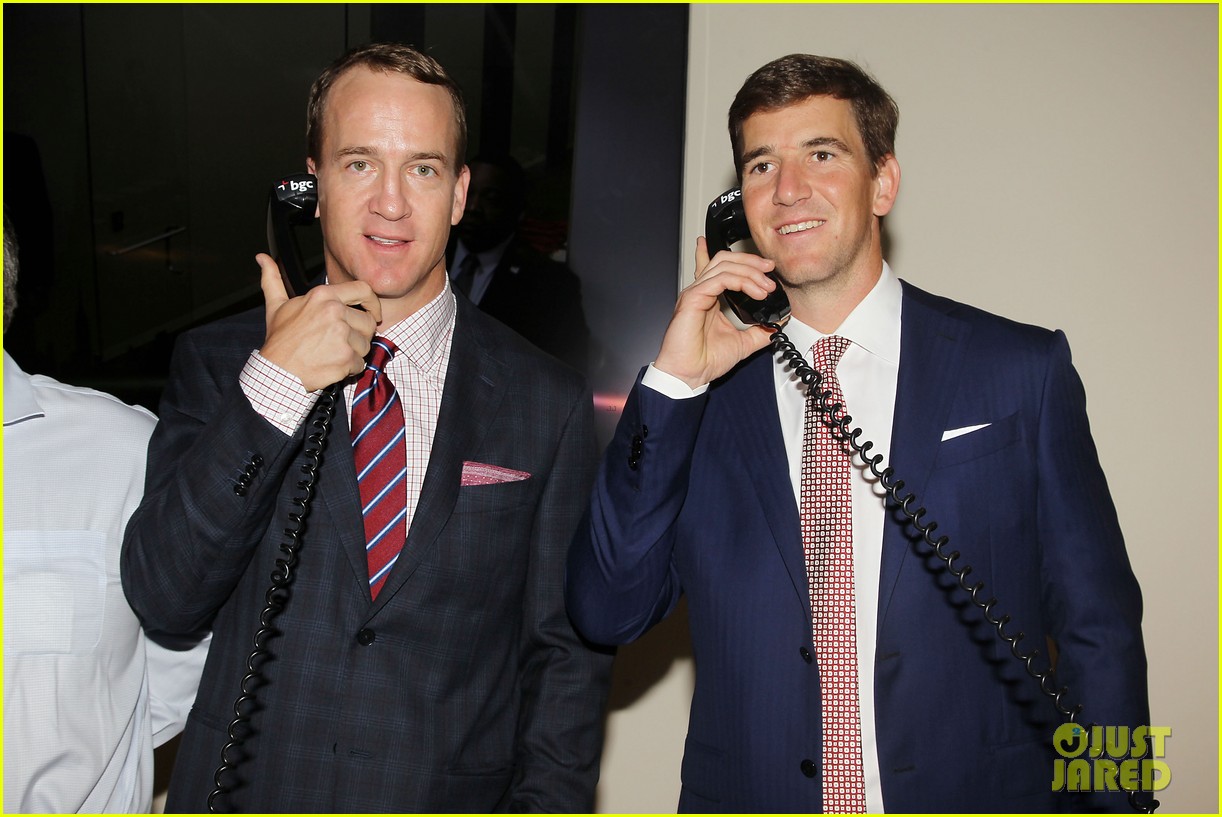 eli peyton manning join other celebs at 911 charity day 10