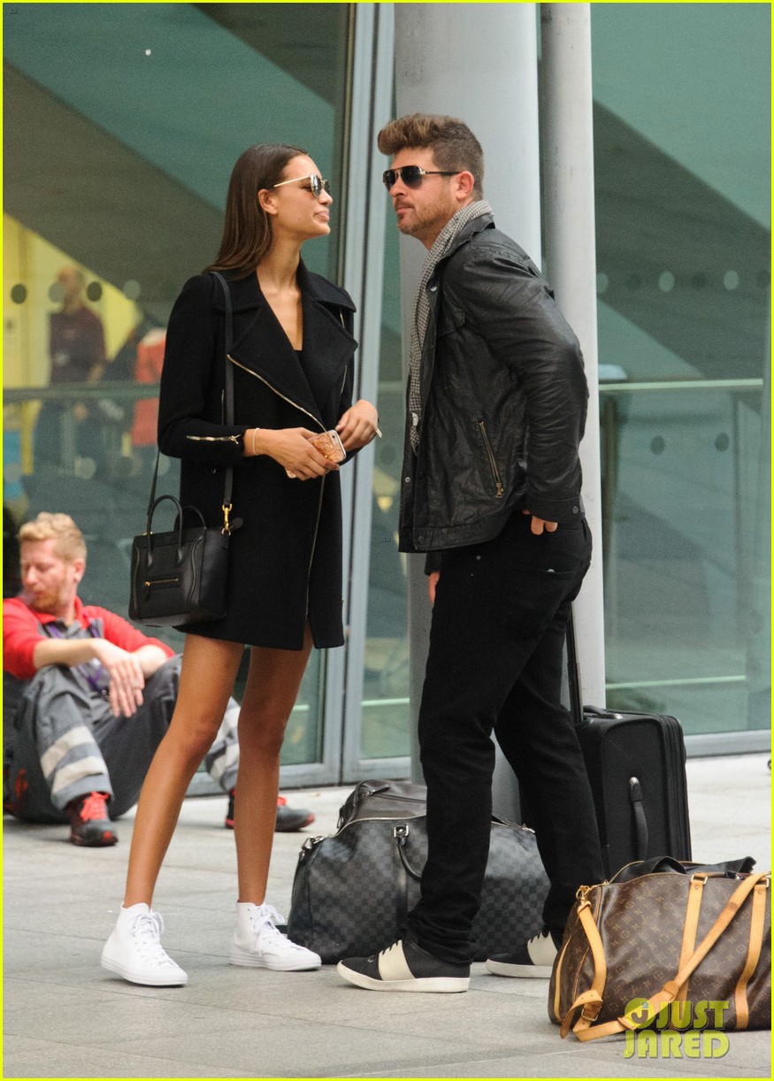 robin thicke and april love head to london pack on the pda 243773594