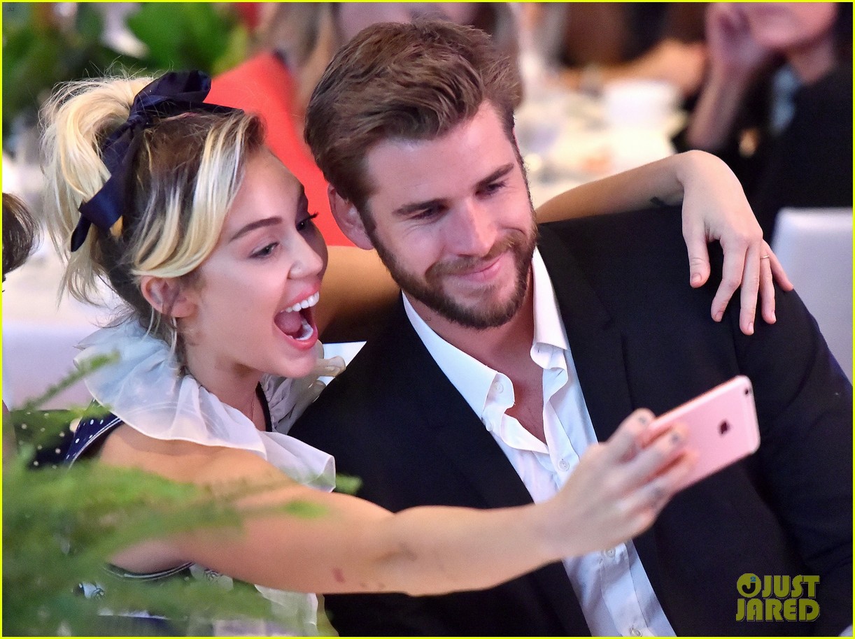 miley cyrus and liam hemsworth couple up at varietys power of women luncheon 033786144