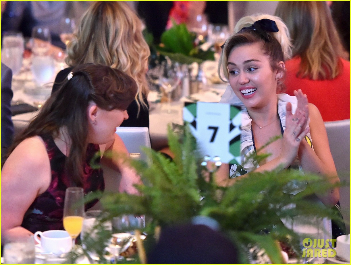 miley cyrus and liam hemsworth couple up at varietys power of women luncheon 143786155