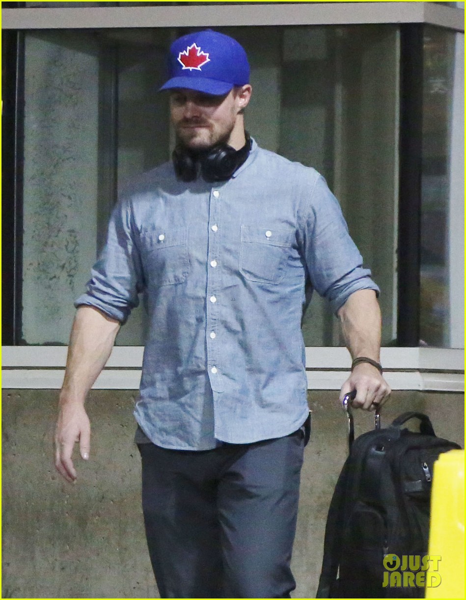 stephen amell grant gustin vancouver airport 093783035
