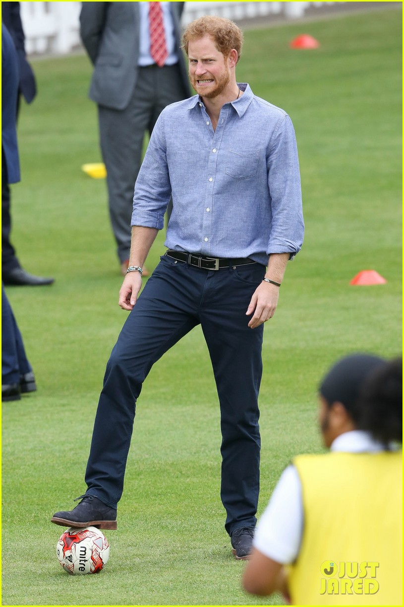 prince harry adorably goofs around while playing soccer 183780438