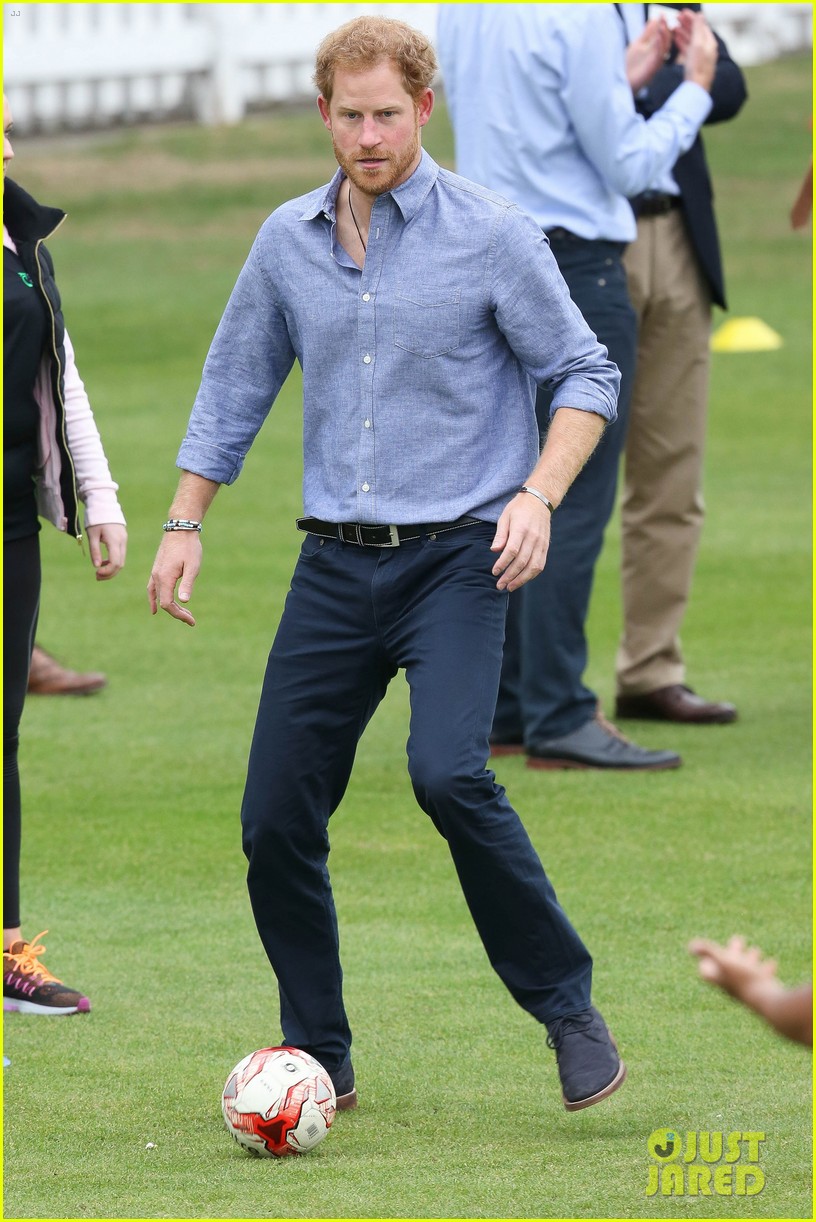 prince harry adorably goofs around while playing soccer 213780441
