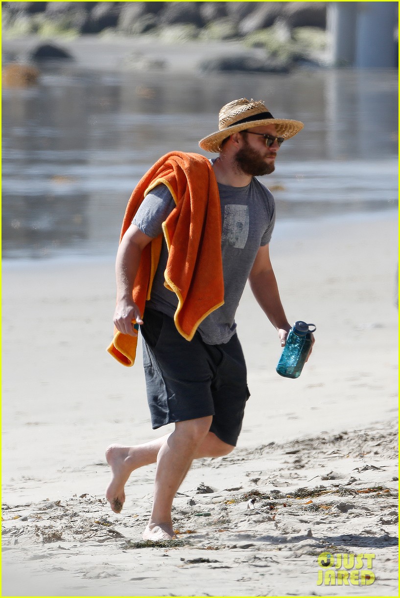 seth rogen and wife lauren miller take their dog for a dip in the ocean 063777195