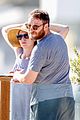 seth rogen and wife lauren miller take their dog for a dip in the ocean 02