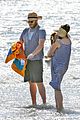 seth rogen and wife lauren miller take their dog for a dip in the ocean 09
