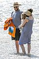 seth rogen and wife lauren miller take their dog for a dip in the ocean 10