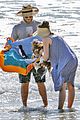 seth rogen and wife lauren miller take their dog for a dip in the ocean 12
