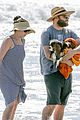 seth rogen and wife lauren miller take their dog for a dip in the ocean 16