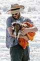 seth rogen and wife lauren miller take their dog for a dip in the ocean 18