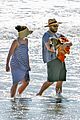 seth rogen and wife lauren miller take their dog for a dip in the ocean 20