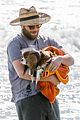 seth rogen and wife lauren miller take their dog for a dip in the ocean 21