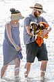 seth rogen and wife lauren miller take their dog for a dip in the ocean 22