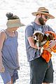 seth rogen and wife lauren miller take their dog for a dip in the ocean 23