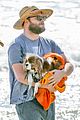 seth rogen and wife lauren miller take their dog for a dip in the ocean 26