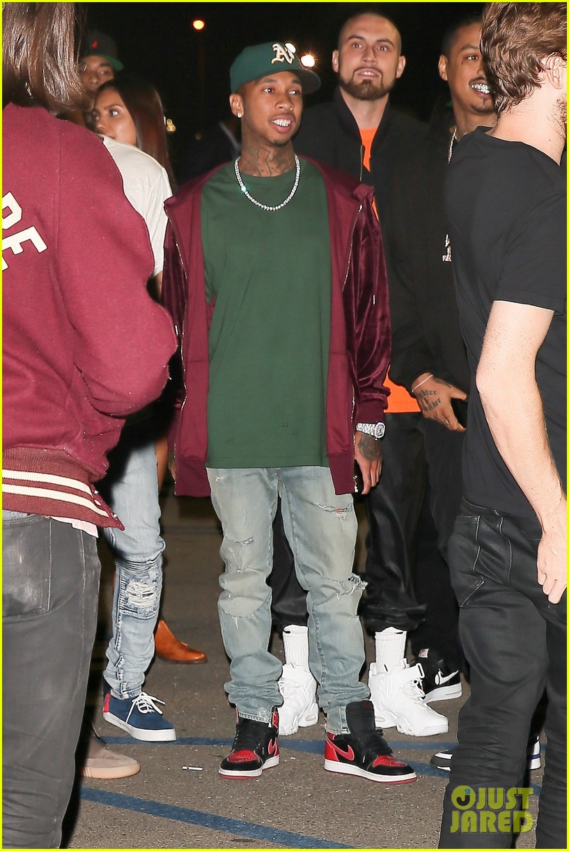 tyga wearing travis scott shoes