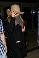 jennifer aniston covers up while arriving back in la 05