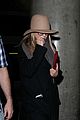 jennifer aniston covers up while arriving back in la 07