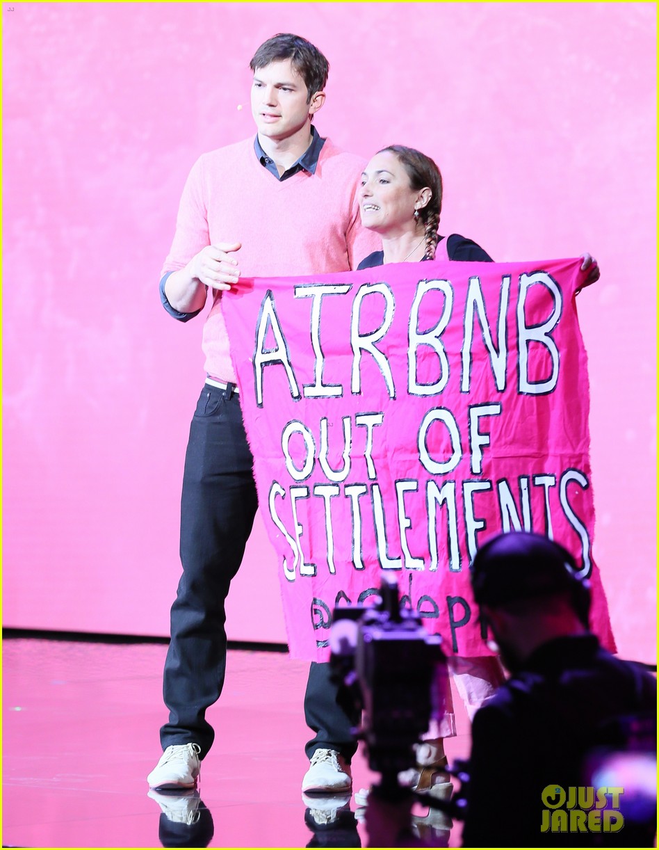 VIDEO Protester Storms Stage During Ashton Kutcher's Speech at AirBnb