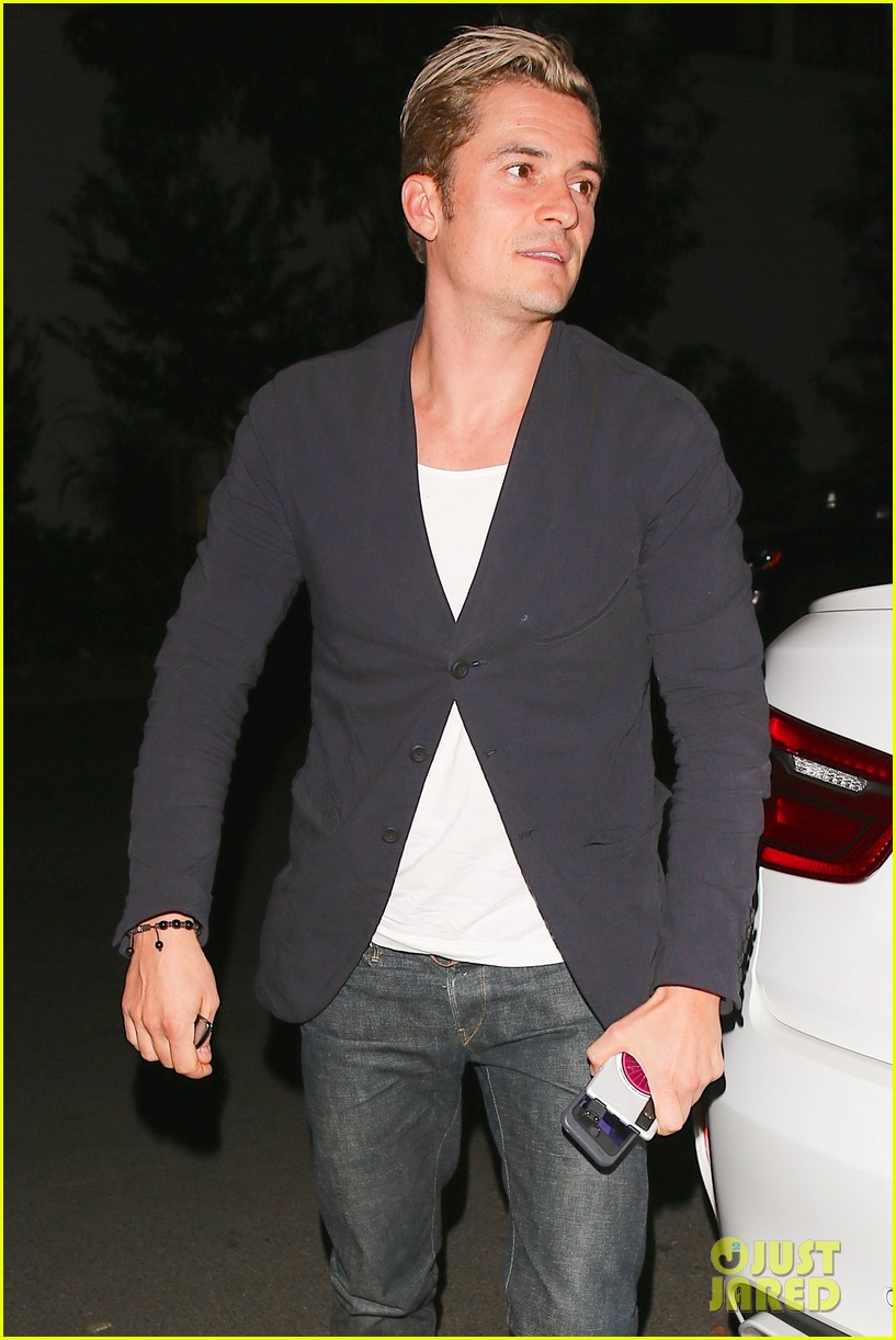 orlando bloom keeps blond locks covered for night out 023811823