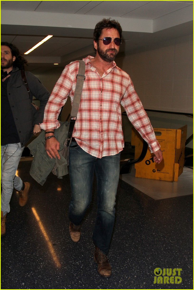 newly single gerard butler catches a solo flight out of lax 233820222